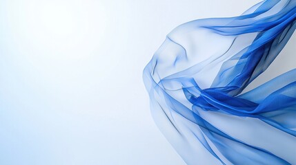 Blue and white scarf flying in the air against a clear background