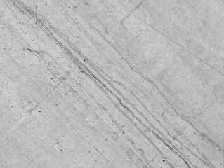 Abstract black and white concrete texture with speckled surface pattern. Weathered cement wall with porous finish. Industrial grunge background