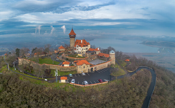 Hněv&iacute;n Castle near the town of Most with a lake
