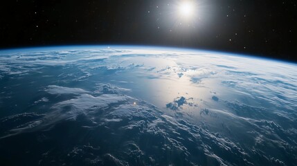 A clear blue sky with a bright sun shining down on the Earth. The sun is positioned in the middle of the sky, and the Earth is visible in the background
