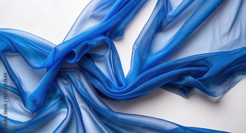 Aufkleber Translucent blue chiffon fabric creating soft flowing folds on a white background suitable for textile design or fashion projects Copy Space