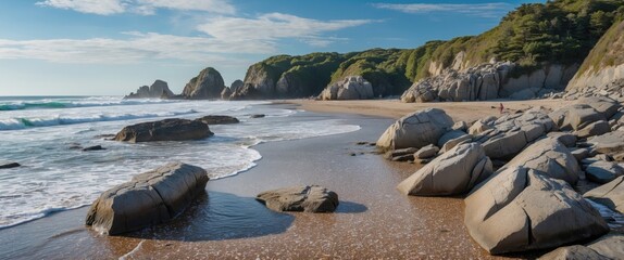Scenic beach landscape with rocky shoreline and gentle waves under a clear sky in daylight Copy Space