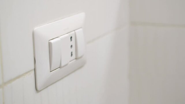 The UK or SG 3 Pin Plug Power converter or travel adapter. The electrical outlet socket in the hotel room