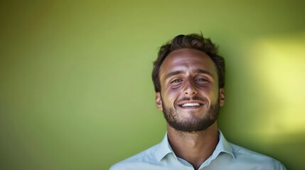 Fototapeta premium Happy Man Smiling Portrait Green Background Studio Shot