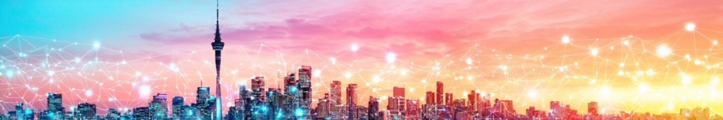 Urban Skyline at Sunset with Vibrant Colors and Digital Connectivity Elements in the Background