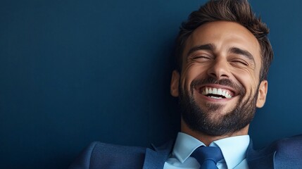 A Man in a Suit Laughs Joyfully and Freely
