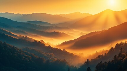 Fototapeta premium A breathtaking mountain landscape at sunrise, featuring golden light illuminating misty valleys and distant peaks.