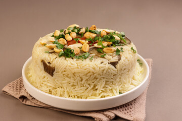 Maqluba or Maqloubeh is Traditional Palestine Rice.