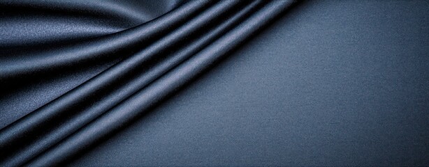 Fototapeta premium Elegant Dark Blue Satin Fabric with Soft Texture and Smooth Drapery for Fashion and Design Projects