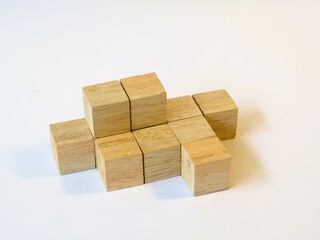 Isometric arranged wooden cube puzzle for logical game isolated white background. Solving logical problems. preschool cognitive learning toys, counting the cube challenge