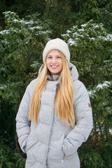 blonde woman outside in the park cosy 3