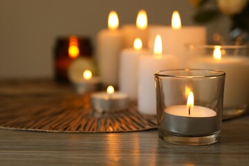 Burning candles in a dark space