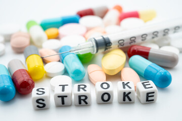 STROKE word, medicine antibiotic pills, tablets and capsules.