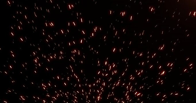 Sparks and fire particles going up