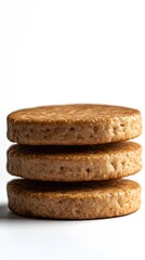 Stack of Three Delicious Round Cookies on White Background in Close Up View