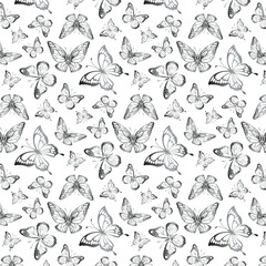 Silver butterflies on a white background.Vector seamless pattern with silver butterflies on a white background.