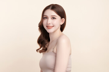 Obraz premium Beautiful young asian woman with clean fresh skin on beige background, Face care, Facial treatment, Cosmetology, beauty and spa, Asian women portrait.