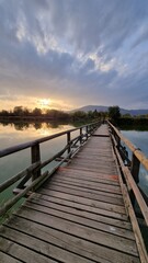 Obraz premium wooden bridge over the lake
