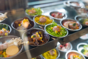 Many kinds of dim sum in showcased at restaurant ready to steam