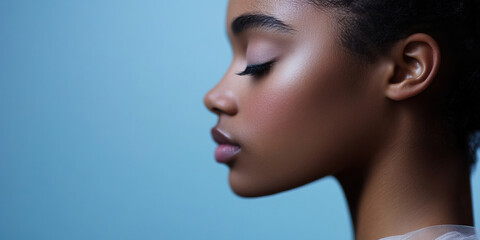 Fototapeta premium Profile Portrait of a Young Woman with Closed Eyes