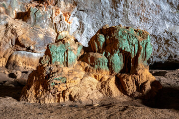 The cave is situated in Killik location of Ahirtas village at Dosemealti  district of Antalya Province.The cave is 633 m long and has two large chambers on the main gallery, which has a clearance.