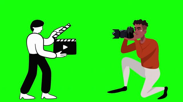 Man holding a film clapper and photographer taking pictures on green background
