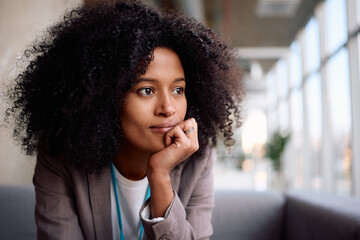 Portrait of pensive black businesswoman in office.