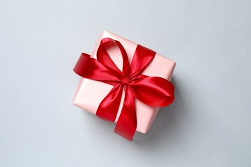 Beautiful gift box on gray background