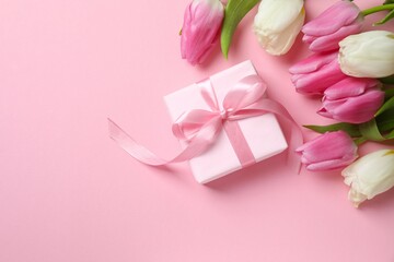Beautiful fresh tulips on color background