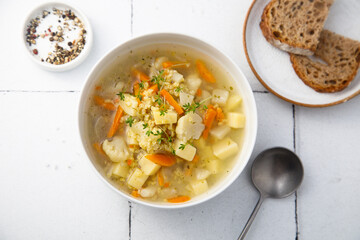 Homemade clear soup with cauliflower