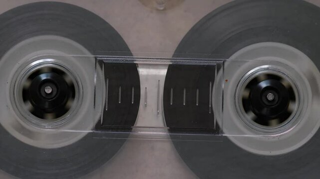 close up audio cassette rewind fast tape, stereo cassette tape recorder rewind film macro