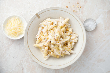 Pasta with cream sauce and walnut