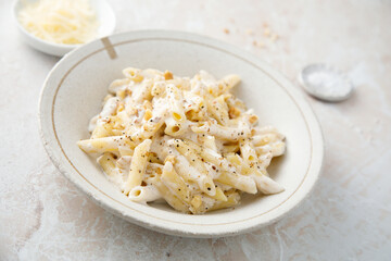 Pasta with cream sauce and walnut