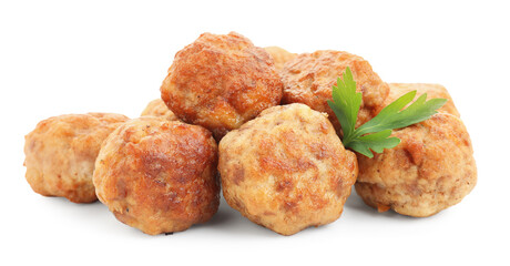 Pile of delicious meatballs and parsley isolated on white