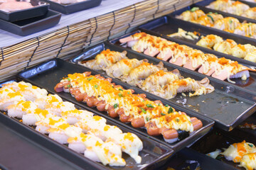 Colorful Assortment of Sushi with Various Toppings