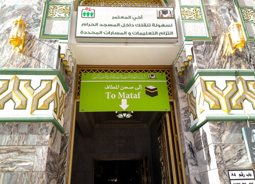 An entrance gate to the Mataf at the Grand Mosque in Mecca, Saudi Arabia, accompanied by a picture of how to enter it, photographed April 25, 2016
