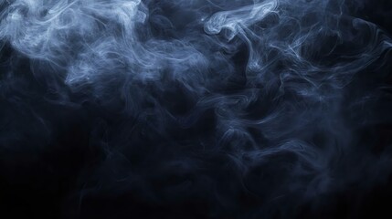 Abstract smoke patterns in shades of blue and gray on a black background, ideal for artistic backgrounds or atmospheric designs.