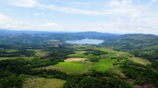 Establishing drone shot of Sauce Resort with a lake during the day in Tarapoto, San Mart&iacute;n Province, Peru
