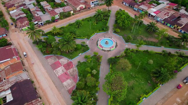 Orbit drone shot of a square in Sauce Resort during the day in Tarapoto, San Mart&iacute;n Province, Peru