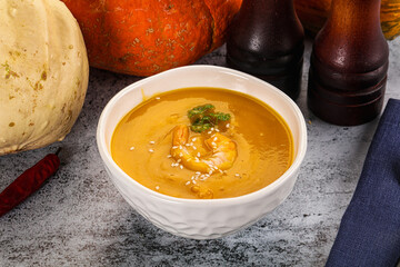 Pumpkin cream soup with prawns