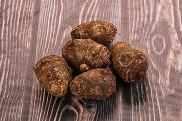 Brown topinambur roots for cooking
