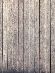Aged wooden surface with aligned planks, rustic texture, and natural tones. Perfect for backgrounds, graphic design, and ecological or vintage themes.
