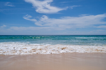 Empty tropical beach and seascape, Beautiful sandy beach and sea in sunny day,Blue sky in good weather day, Beach sea space area nature background