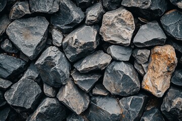 Obraz premium Variety of rough gray stones in close-up view. AI generated