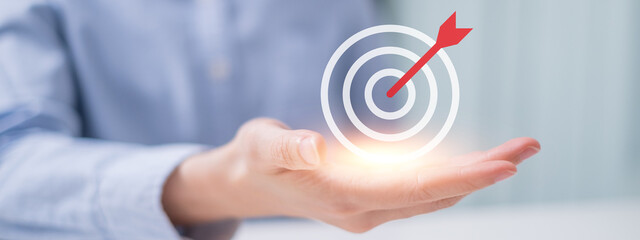 Hand holding business target goal growth success development management strategy concept