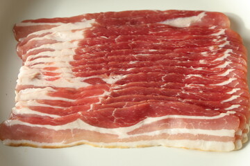 raw bacon slices