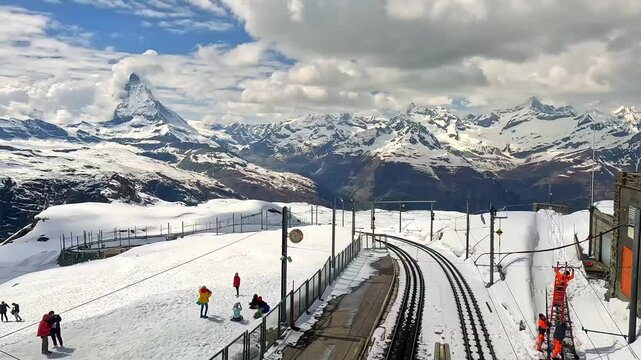 Summit station with tourists at Gornergrat Matterhorn in Switzerland