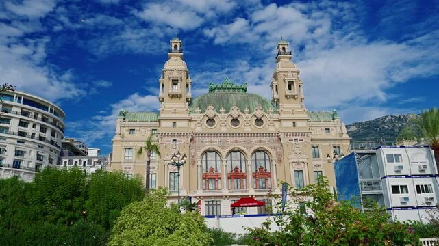 Grand Casino in Monte Carlo timelapse, Monaco. Historical building. Blue cloudy sky at summer day