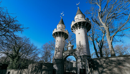Historic architecture of a castle gate in Aberdeen Scotland under a clear blue sky