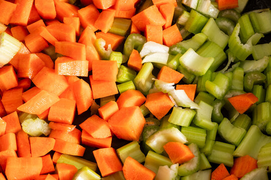 braising carrot celery and onion to prepare italian soffritto -